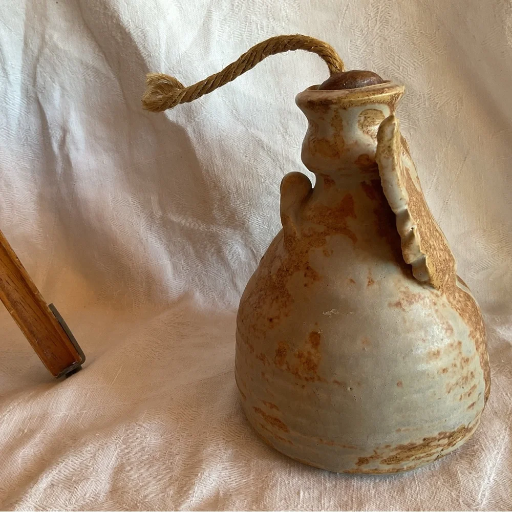 pottery angel oil lamp W/Original wick glazed in earthy brown tones Signed